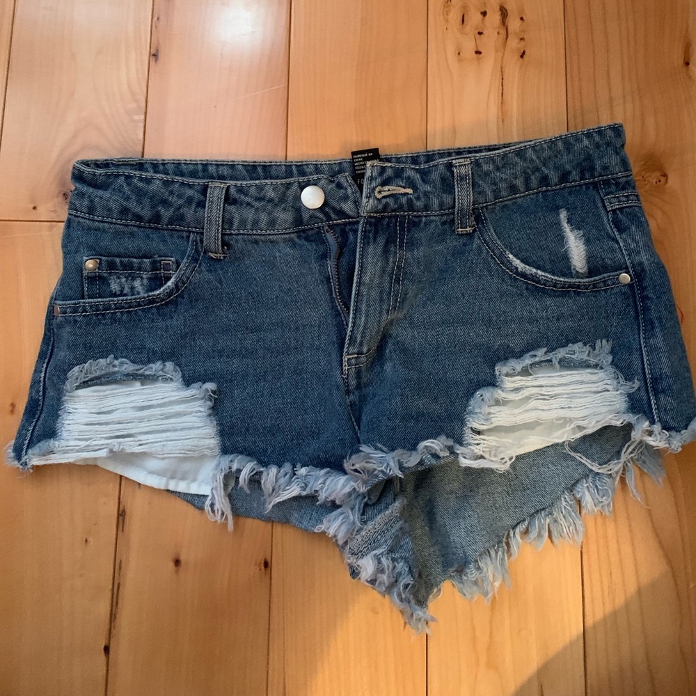 Distressed dark washed jean shorts